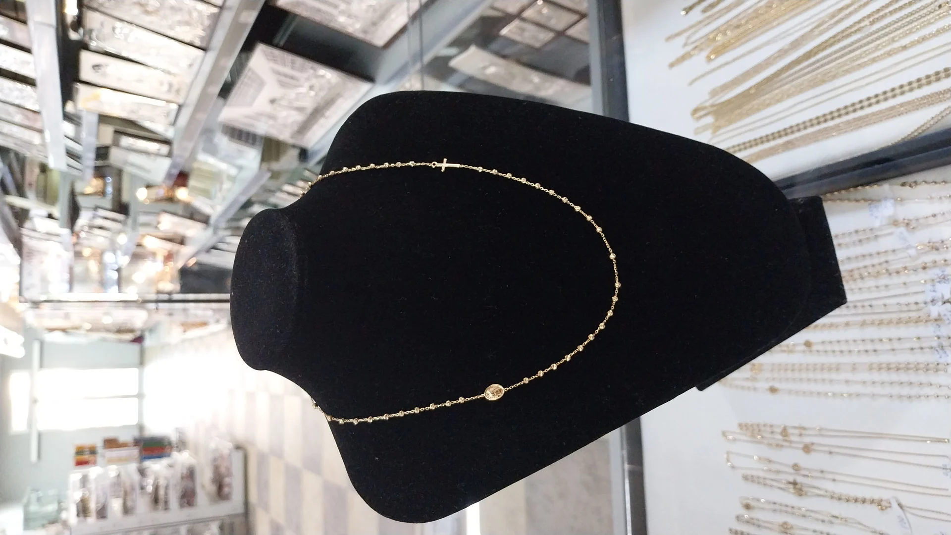 Gold necklace rosary with Our Lady medal